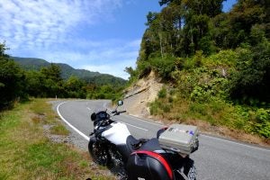 Riding across Karamea Bluff: it doesn't get much better. Photo: The Bear